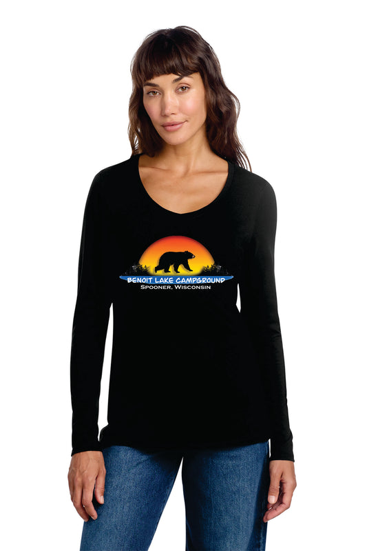 Woman wearing a black long-sleeve shirt with a bear graphic and text on a white background